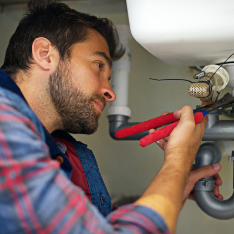 hes-a-pro-at-plumbing-shot-of-a-plumber-fixing-a-2023-11-27-05-34-21-utc